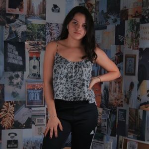 Camo patterned flared out spaghetti strap crop top